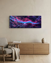 Panoramic deep-space nebula in glowing magenta and electric cyan, scattered with countless stars across a dark cosmic field. panoramic glass wall art A