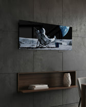 Relaxing Astronaut on the Moon Glass Wall Art (36"x14")