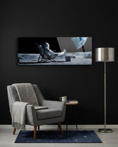 Relaxing Astronaut on the Moon Glass Wall Art (36"x14")