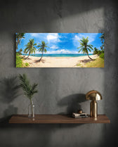 A wide tropical beach lined with leaning coconut palms above turquoise water and a bright blue, cloud-filled sky. panoramic glass wall art D