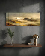 A dreamy valley of rolling green and golden hills wrapped in soft morning mist and warm sunrise light. panoramic glass wall art D