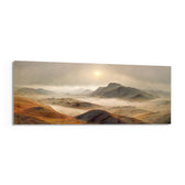 A rugged range of ochre and red-brown mountains and hills wrapped in drifting fog beneath a pale rising sun. panoramic glass wall art F