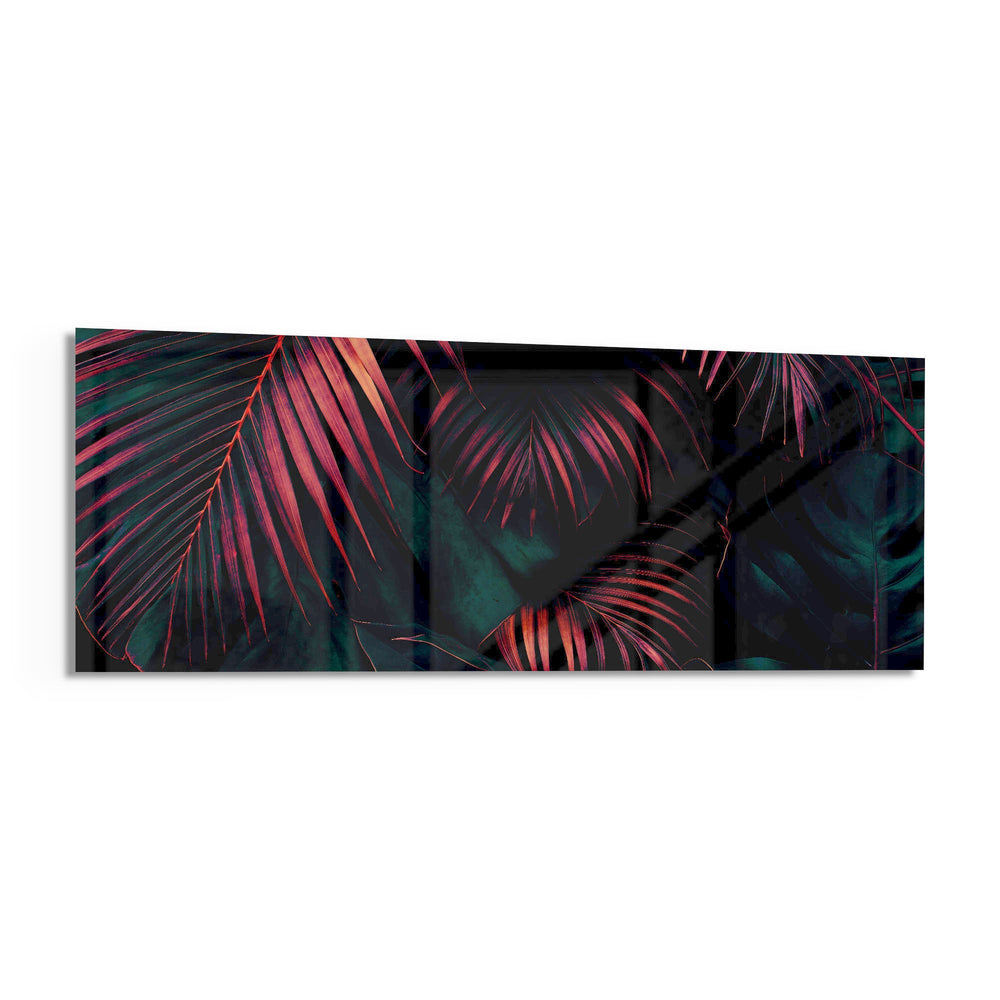 A moody close-up of tropical palm fronds glowing neon pink against deep, dark green jungle foliage. panoramic glass wall art F