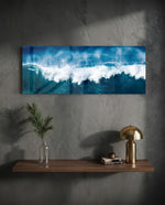 A powerful blue ocean wave breaking into white foam and spray across a wide panoramic seascape. panoramic glass wall art D