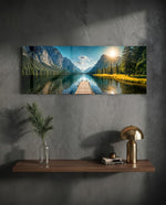 Panoramic alpine landscape of a mirror-calm lake with a wooden dock leading toward sunlit mountains and pine forest. panoramic glass wall art D