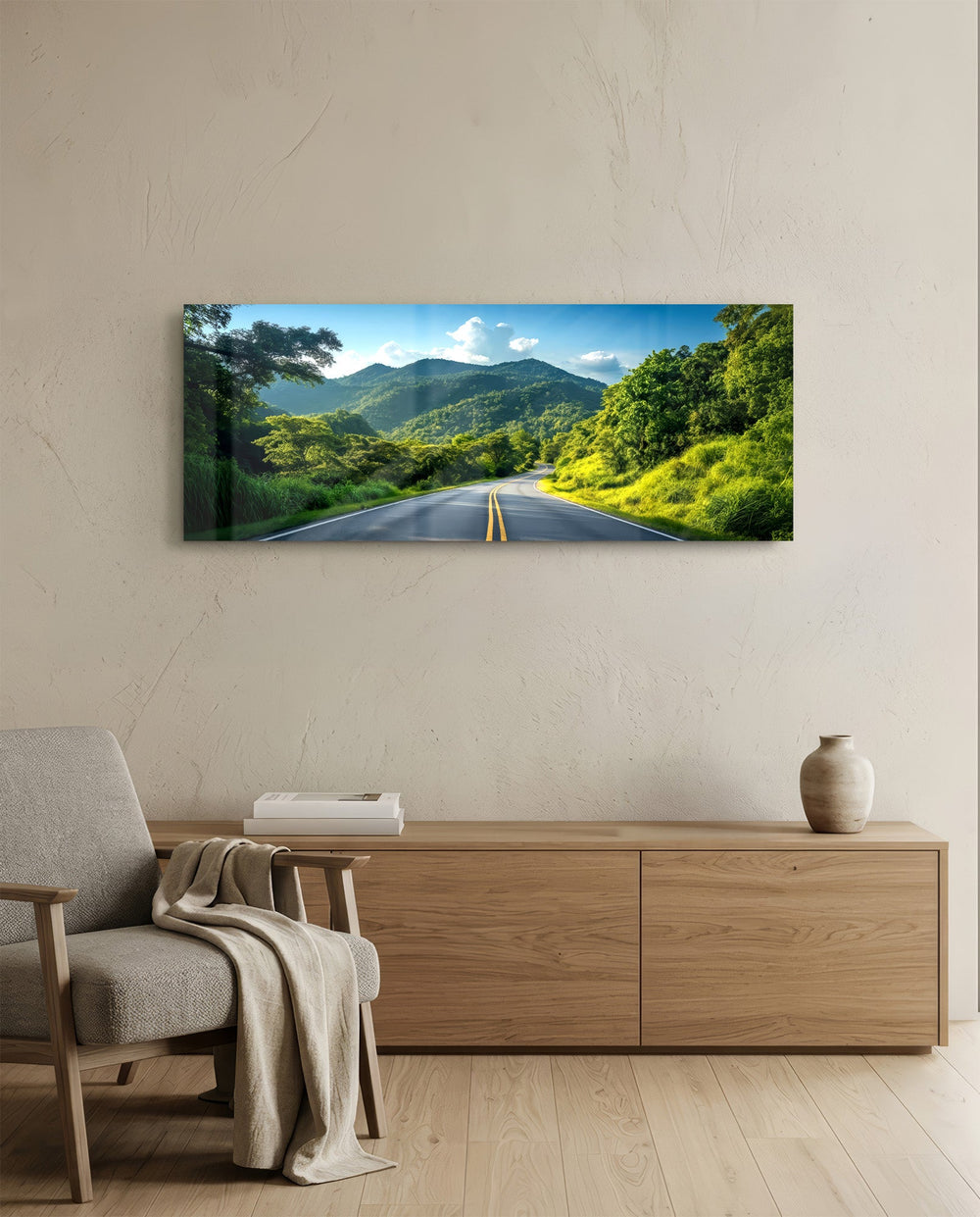 Panoramic view of an empty asphalt road curving through lush green tropical mountains under a bright blue sky. panoramic glass wall art A