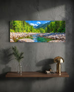 Illustrative panoramic landscape of a clear rocky river running through a bright green pine forest below mountains. panoramic glass wall art D