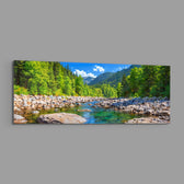 Illustrative panoramic landscape of a clear rocky river running through a bright green pine forest below mountains. panoramic glass wall art E