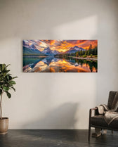 Snow-capped mountain peaks mirrored in a still alpine lake beneath a blazing golden sunset. panoramic glass wall art C