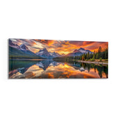 Snow-capped mountain peaks mirrored in a still alpine lake beneath a blazing golden sunset. panoramic glass wall art F