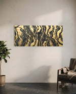 A luxurious abstract of black and gold marbled agate with rippling veins and textured gold-leaf swirls panoramic glass wall art C