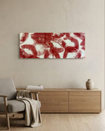 A scattered pattern of deep red lipstick kiss prints stamped across a creamy white surface panoramic glass wall art A