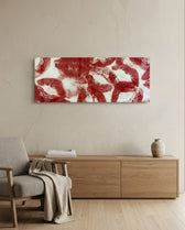 A scattered pattern of deep red lipstick kiss prints stamped across a creamy white surface panoramic glass wall art A