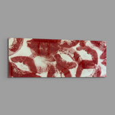 A scattered pattern of deep red lipstick kiss prints stamped across a creamy white surface panoramic glass wall art E
