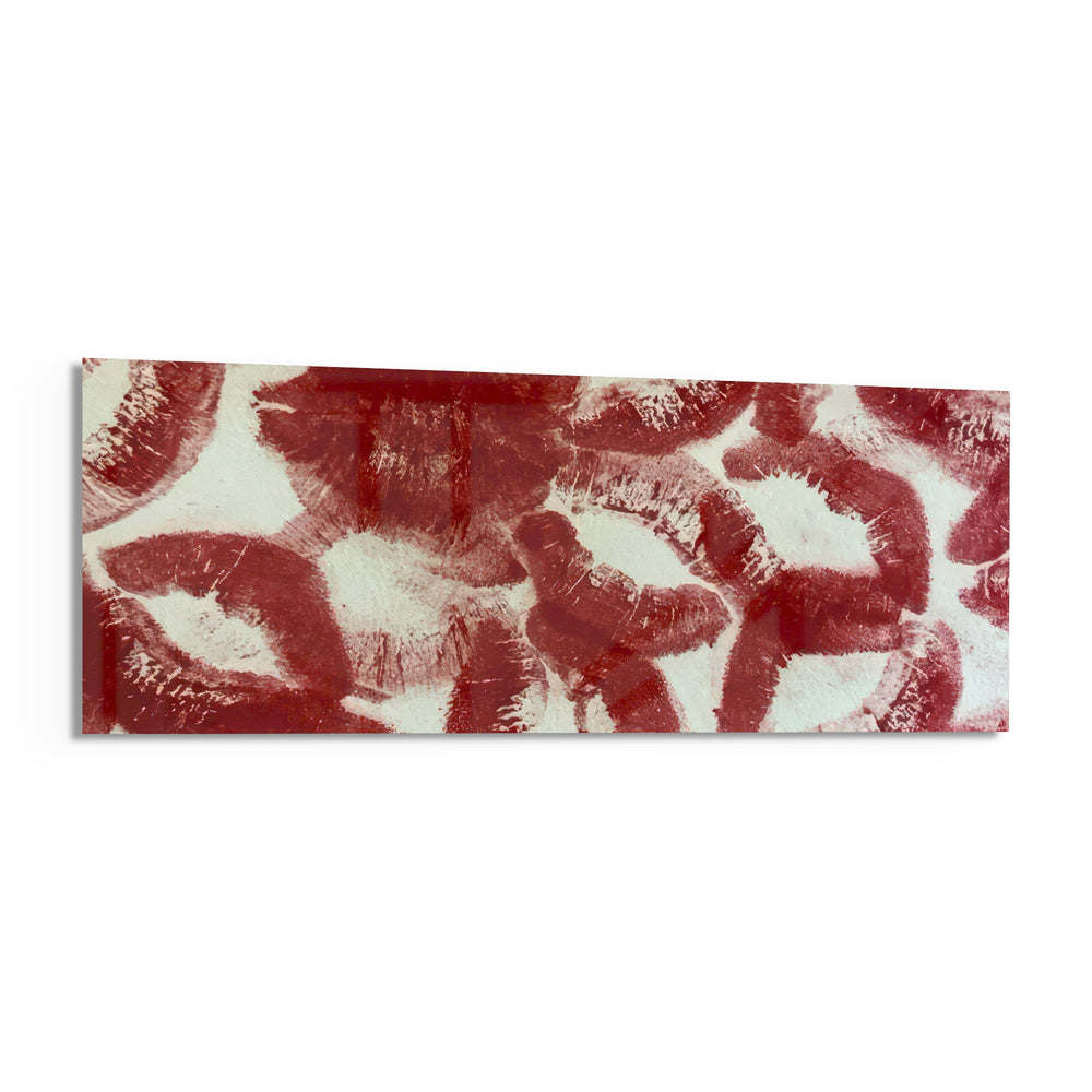 A scattered pattern of deep red lipstick kiss prints stamped across a creamy white surface panoramic glass wall art F