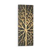 A textured gold tree of life spreading radiating branch-and-vein lines across a dark charcoal background panoramic glass wall art D