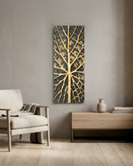 A textured gold tree of life spreading radiating branch-and-vein lines across a dark charcoal background panoramic glass wall art F