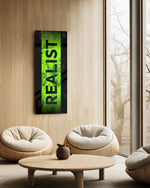 The single bold word "REALIST" in black over a distressed toxic-green stripe framed by black borders. panoramic glass wall art C