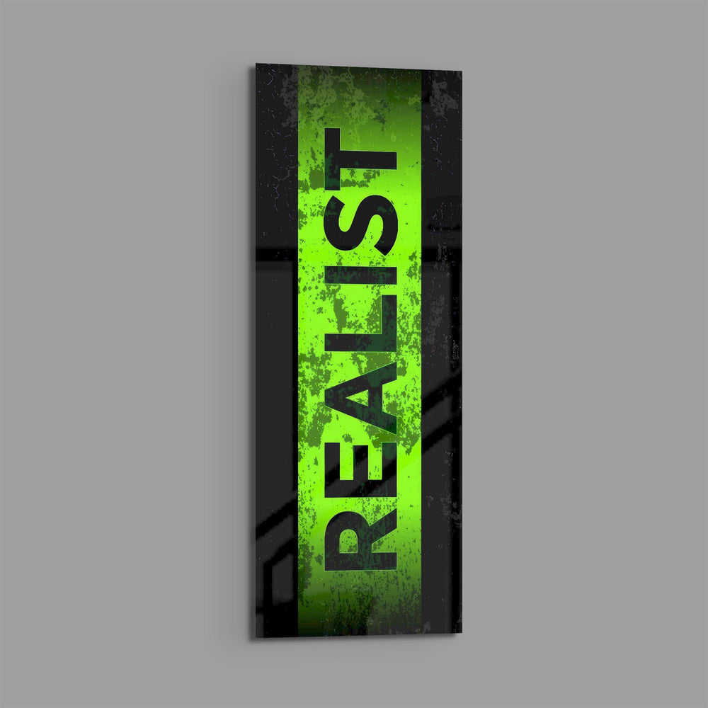 The single bold word "REALIST" in black over a distressed toxic-green stripe framed by black borders. panoramic glass wall art E