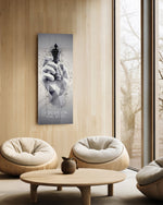 Low-poly monochrome hand grasping a black chess king as fragments burst around it. panoramic glass wall art C