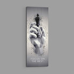 Low-poly monochrome hand grasping a black chess king as fragments burst around it. panoramic glass wall art E