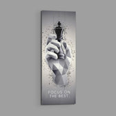 Low-poly monochrome hand grasping a black chess king as fragments burst around it. panoramic glass wall art E
