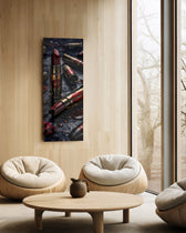 Dark, dramatic still life of crimson lipsticks shaped like brass cartridges, scattered with red lip prints, petals and water droplets. panoramic glass wall art C