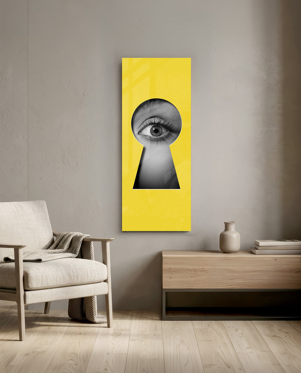 A black-and-white human eye peering out through a keyhole-shaped cutout in a flat, bright-yellow surface. panoramic glass wall art F