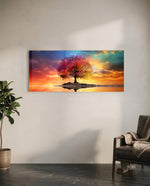A lone tree with multicolored foliage standing on a small island, mirrored in still water beneath a fiery, cloud-swept sunset sky. panoramic glass wall art C