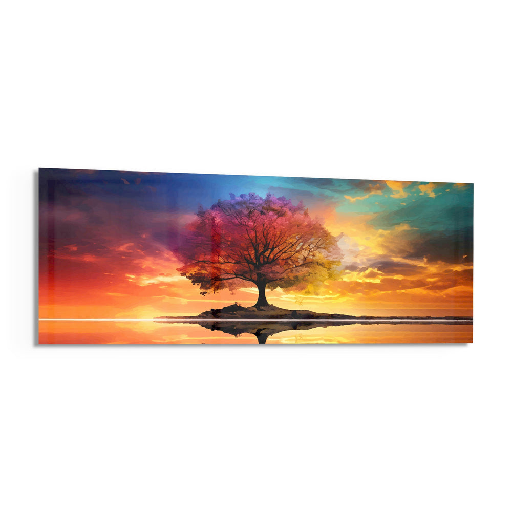 A lone tree with multicolored foliage standing on a small island, mirrored in still water beneath a fiery, cloud-swept sunset sky. panoramic glass wall art F
