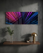 A macro fan palm leaf lit in electric neon pink and blue, its fronds radiating from a single dark point. panoramic glass wall art D