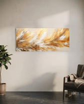 A textured abstract of feather-like strokes in gold leaf, cream and white sweeping across the panel. panoramic glass wall art C