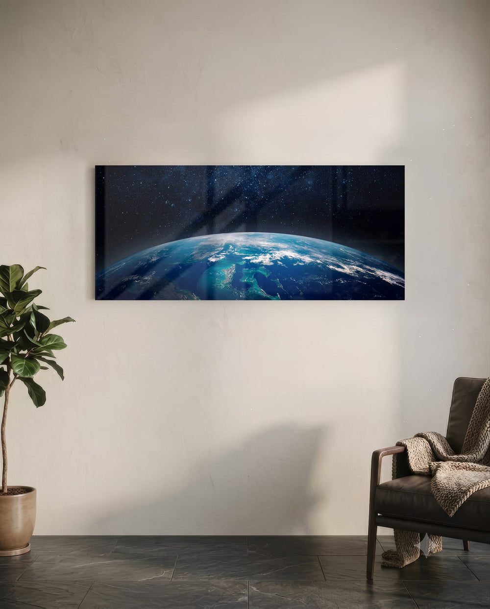 The curved edge of planet Earth seen from orbit, blue oceans and swirling clouds under a starry black sky. panoramic glass wall art C