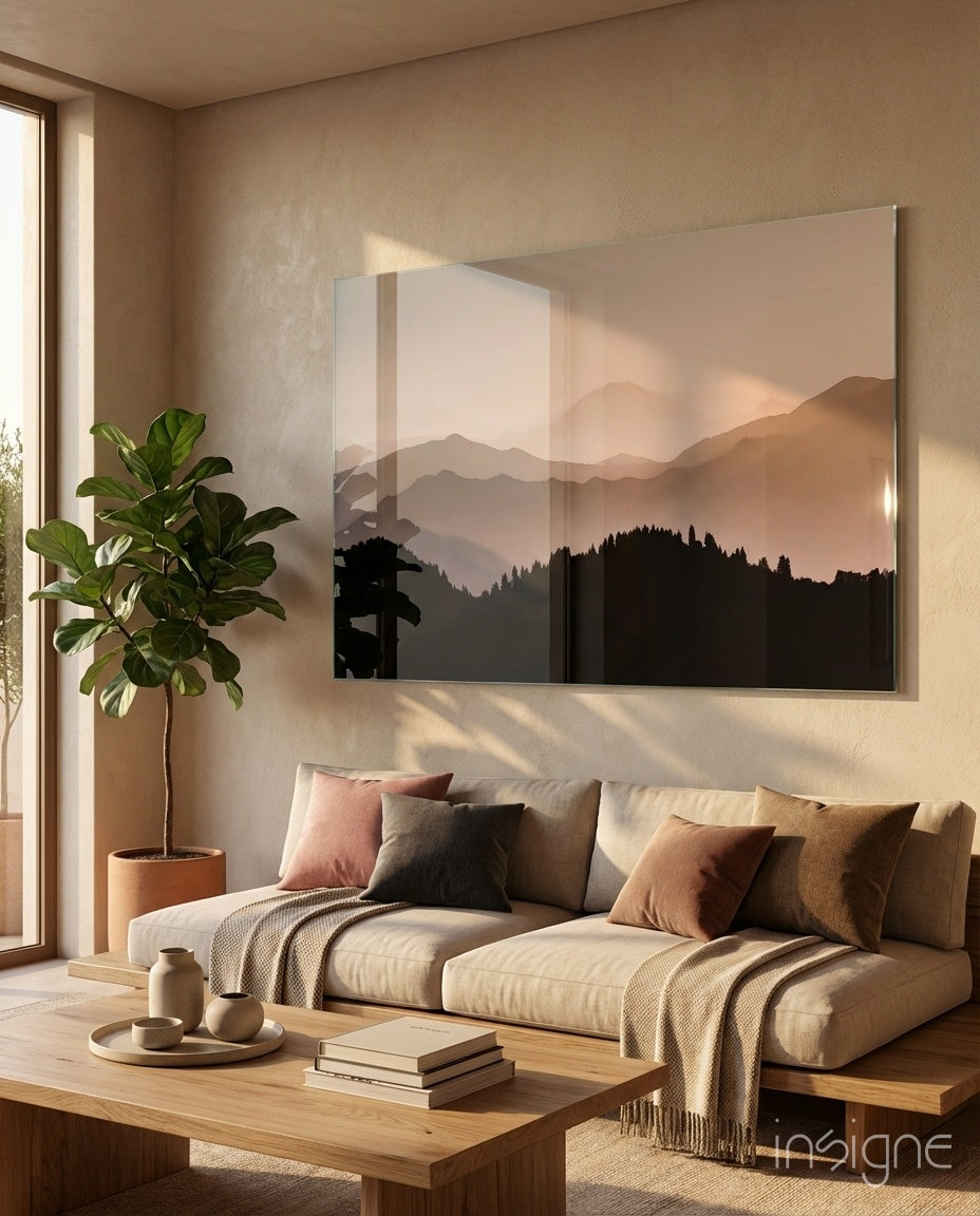 Mountains glass wall art displayed above a sofa in a contemporary living room