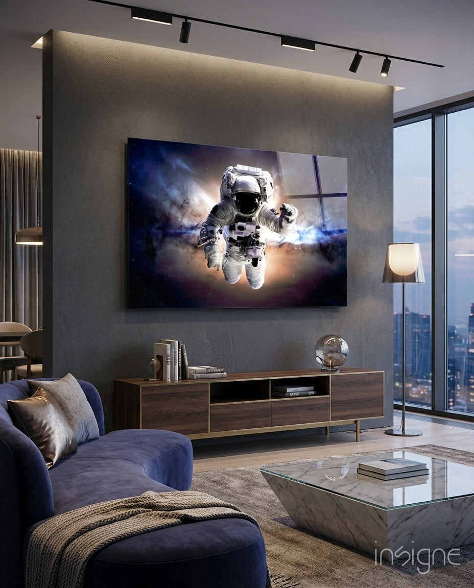 Astronaut glass wall art displayed above a sideboard in a city-view living room