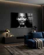 Butterfly Lips glass wall art displayed above a sideboard in a charcoal living room