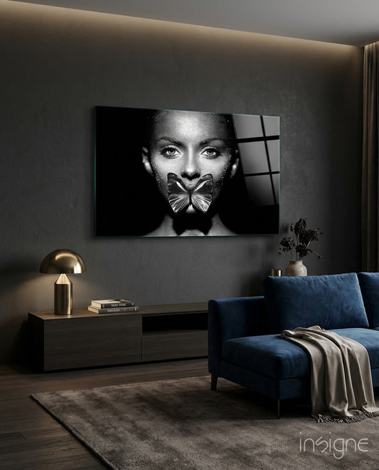 Butterfly Lips glass wall art displayed above a sideboard in a charcoal living room