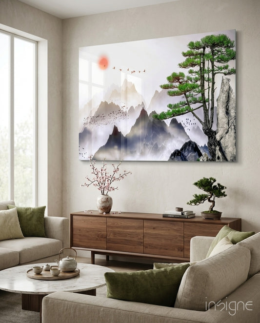 Mountain Pine glass wall art displayed above a wood sideboard in a serene living room