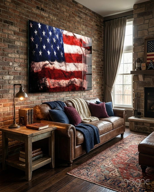 American Flag glass wall art displayed above a leather sofa in a brick-walled study