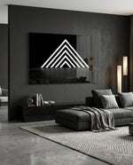 Triangle glass wall art displayed above a marble sideboard in a charcoal living room