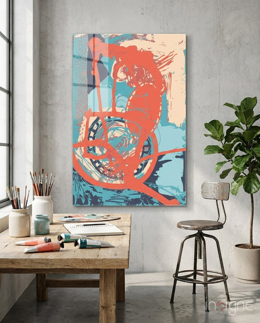 Cycle glass wall art displayed above a wood worktable in an art studio
