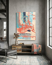 Scribble glass wall art displayed above a sideboard in an industrial concrete loft
