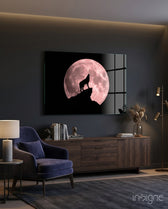 Pink Moon Wolf glass wall art displayed above a sideboard in a charcoal living room
