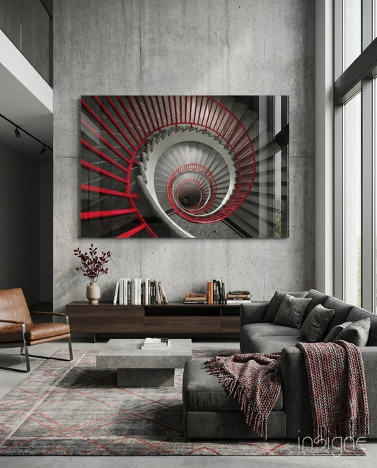 Red Spiral glass wall art displayed above a sideboard in a concrete loft