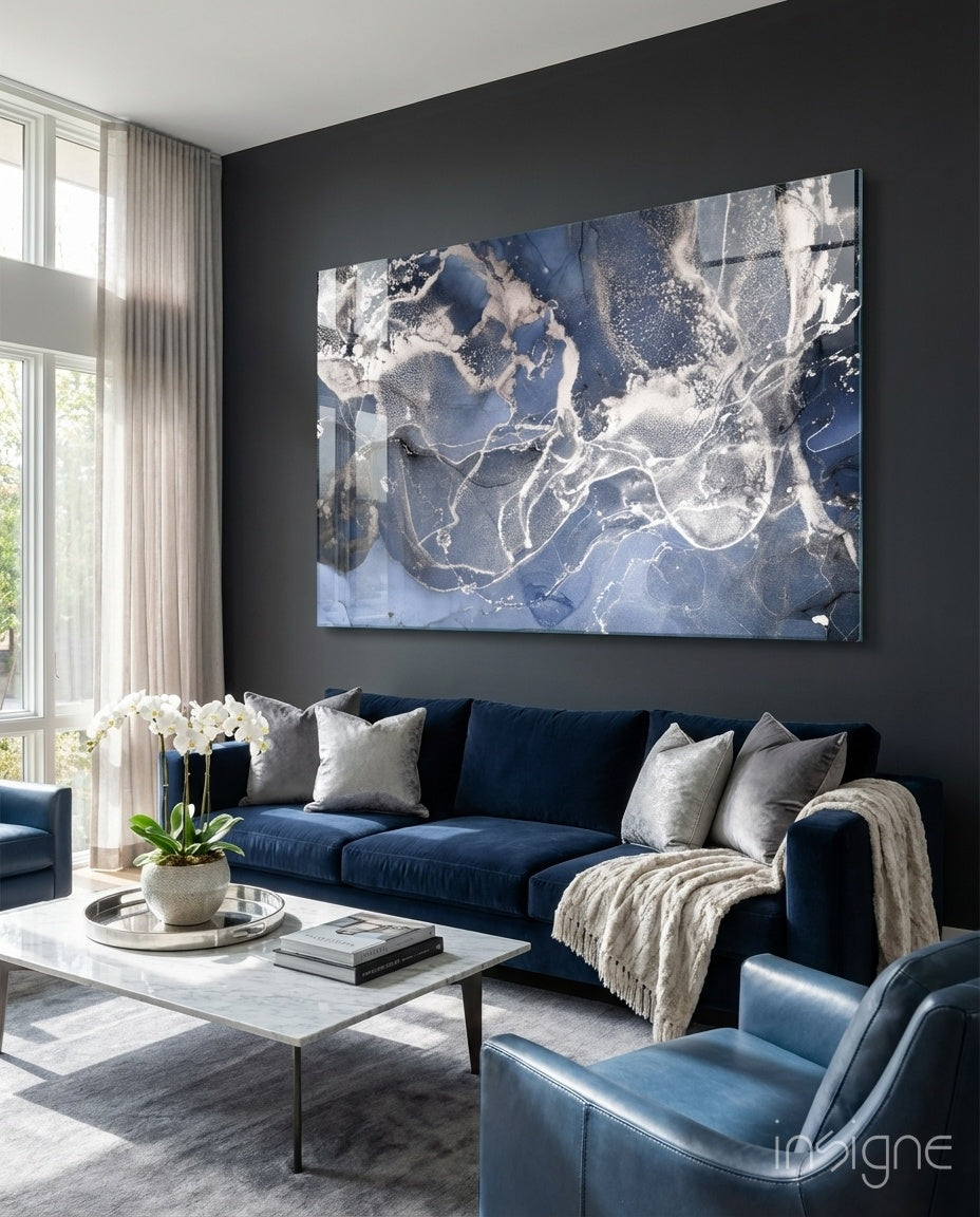 Sapphire Marble glass wall art displayed above a navy sofa in a contemporary living room