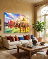 Indian Elephant glass wall art displayed above a beige sofa in a Mediterranean living room