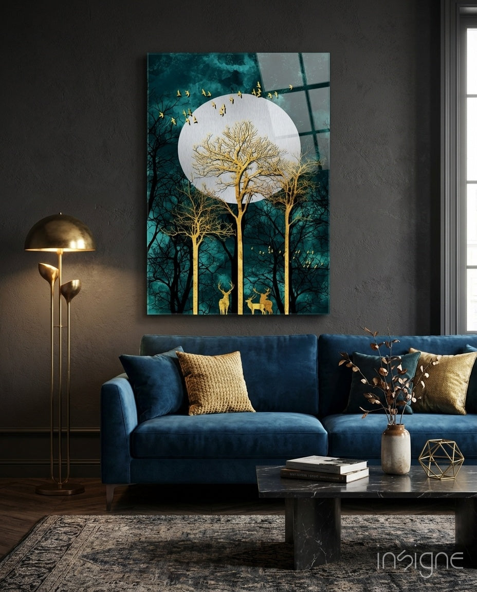 Gold Forest Deer glass wall art displayed above a navy velvet sofa in a charcoal-walled lounge