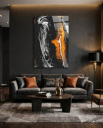 Bronze Ribbon glass wall art displayed above a velvet sofa in a charcoal-walled lounge