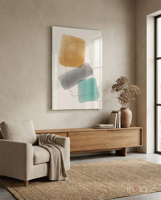 Soft Trio glass wall art displayed above a wood console in a beige sunlit interior