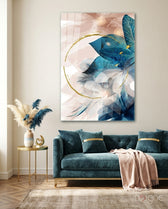 Coral Bloom glass wall art displayed above a teal velvet sofa in a contemporary lounge